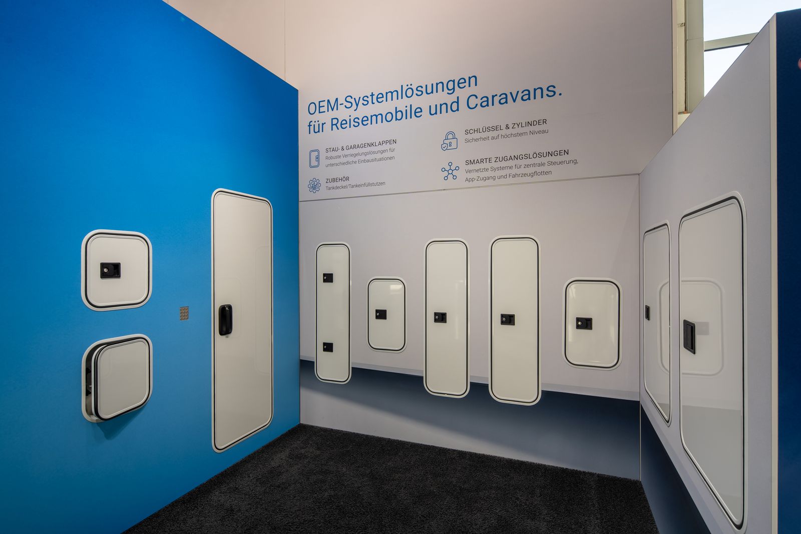 STS booth with storage hatch demonstrators